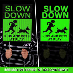 Fumete sign installed on lawn by driveway demonstrating increased driver awareness