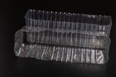Generic clear liner front view showing shape and fit, protecting planters