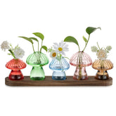 Glasseam front view of five mushroom vases showing playful display and modern decor benefit