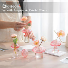 Glasseam single mushroom vase holding a green stem to demonstrate propagation and aesthetic appeal