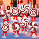 GlikCeil front view of eight red-white lollipop signs showing festive curb appeal