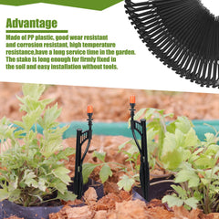 GlikCeil stakes installed in garden bed holding micro-sprinkler risers steady