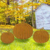 GlikCeil front view of three rustic pumpkin stakes showing autumn curb appeal