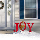 Glitzhome front view showing JOY lettering and angel motif, bright holiday curb appeal