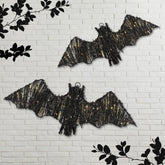 Glooglitter front view of two rattan bats showing silhouette and LED glow