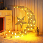 Glooglitter front view of moon and star showing festive glow and curb appeal