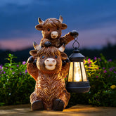 Goodeco Highland cow front view showing detailed sculpting and garden charm