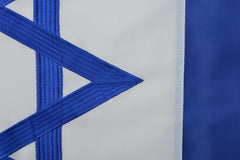 Green Grove embroidered close-up showing Star of David detail and durable texture benefit