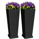 Greesum front view of two black tall planters, adds symmetry to entryway