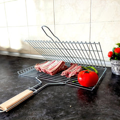 Hakan basket folded open flat to show cooking area and portability benefit