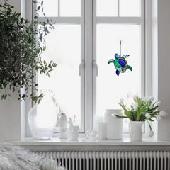 HAOSUM sea turtle hanging in a sunny window casting ocean-colored light