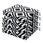 HARBOREST front view of four cushions showing black white diamond pattern and neat package