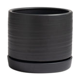 HERDUK front view of matte black ceramic planter showing cylinder shape and finish, enhances decor