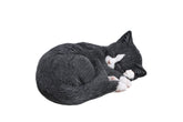 HI-LINE front view of black and white sleeping cat statue, adds charming focal point