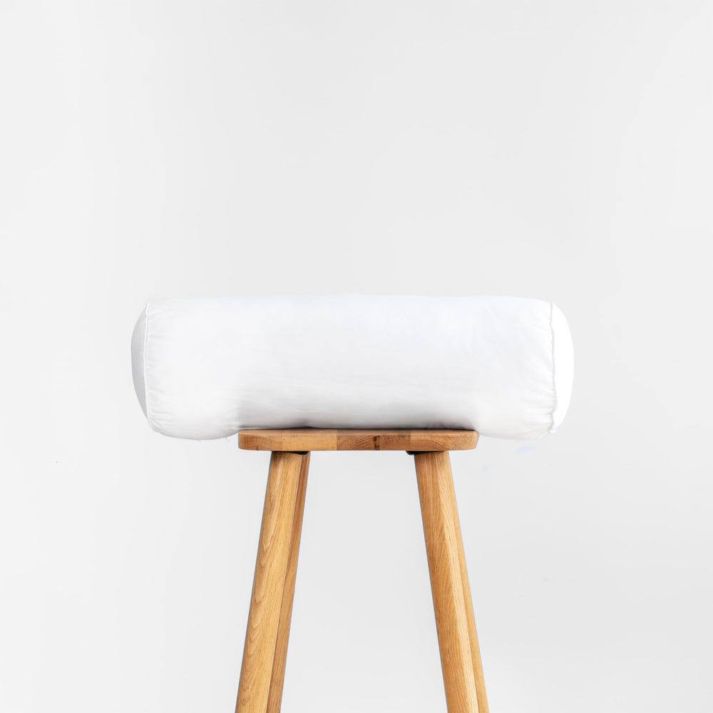 Hofdeco Premium bolster front view showing full shape and crisp edges for stylish seating