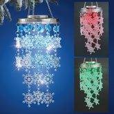 Hokfirm front view of snowflake wind chimes showing festive outdoor charm
