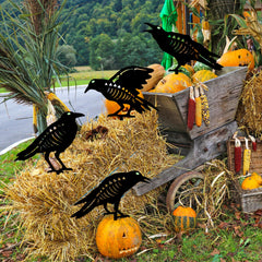 Hokfirm garden scene with stakes among plants adding spooky curb appeal