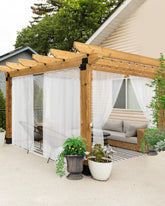 HolidayIdeas front view of six white outdoor sheer curtain panels showing neat packaging and size