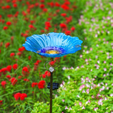 Homight front view of blue glass birdbath showing decorative shape and stability
