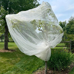 Homoda front view showing full 15x15ft coverage protecting a fruit tree