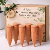 Honeydak front view of six terracotta spikes with lids showing complete kit and convenience