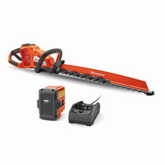 Husqvarna Hedge Master 320iHD60 front view showing compact cordless body and blade — clear handling