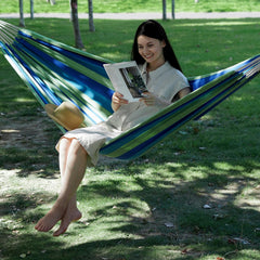 INNO STAGE hammock hanging between trees with included tree straps for easy setup