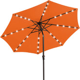 JEAREY 9' orange umbrella front view showing full canopy and solar LEDs for night use