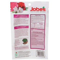 Jobe's Organics spike inserted at shrub root zone for efficient feeding