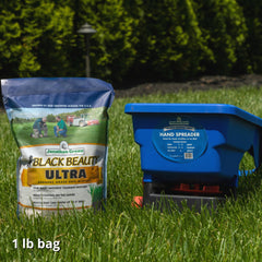 Jonathan Green spreading seed on lawn showing wide 10-foot broadcast coverage