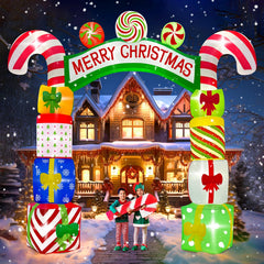 Kalolary archway front view showing colorful gifts and Merry Christmas banner for curb appeal