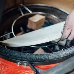 Kamado Joe plates beside grill grate for scale and easy installation advantage