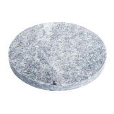 Kamado Joe soapstone front view showing half-moon shape and non-stick surface for gentle grilling