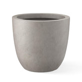 Kante front view buff concrete planter showing modern shape and stability
