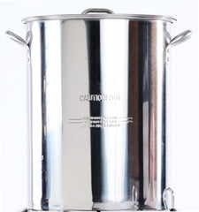 King Kooker pot in backyard use with bird being lowered, demonstrating safe operation