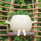 KIUGCO front view glossy smiley face planter showing cheerful decor benefit