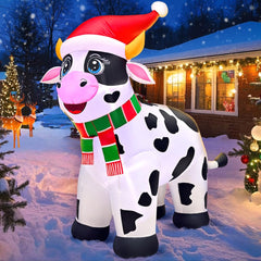 KOOY Christmas cow front view showing festive Santa hat and cheerful pose for curb appeal