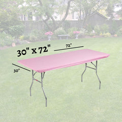 Kwik-Covers on a 6-foot table outdoors demonstrating wind resistance