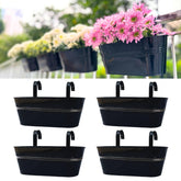 LáLáGreen front view of four black metal planters showing neat uniform set and modern look