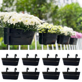 LáLáGreen front view showing eight black rail planters, neat balcony styling benefit
