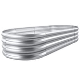 Land Guard front view of galvanized raised bed showing sturdy oval shape and curb appeal