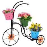 LEWIS&WAYNE front view of tricycle planter showing colorful display and curb appeal