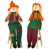 Libima front view of sitting scarecrows showing friendly fall welcome