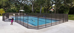 Life Saver Pool Fence front view showing brown 4ftx12ft section and poles for safety