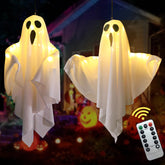 Lifnatty front view of two hanging ghost lights showing spooky glow and easy setup