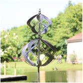 LimeHill front view of silver spherality wind spinner shows striking outdoor focal point