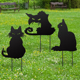 Lingvee front view of three black cat stakes showing Halloween curb appeal