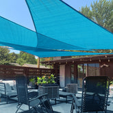 LOVE STORY front view of turquoise triangle sail showing color and shape, improves patio shade