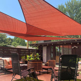 LOVE STORY front view of terra red triangle sail adding shaded patio area