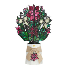 Lovepop poinsettia front view showing 3D shimmer bouquet and festive appeal